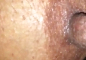 Ebony MILF shows off her huge black boobies in the close-up